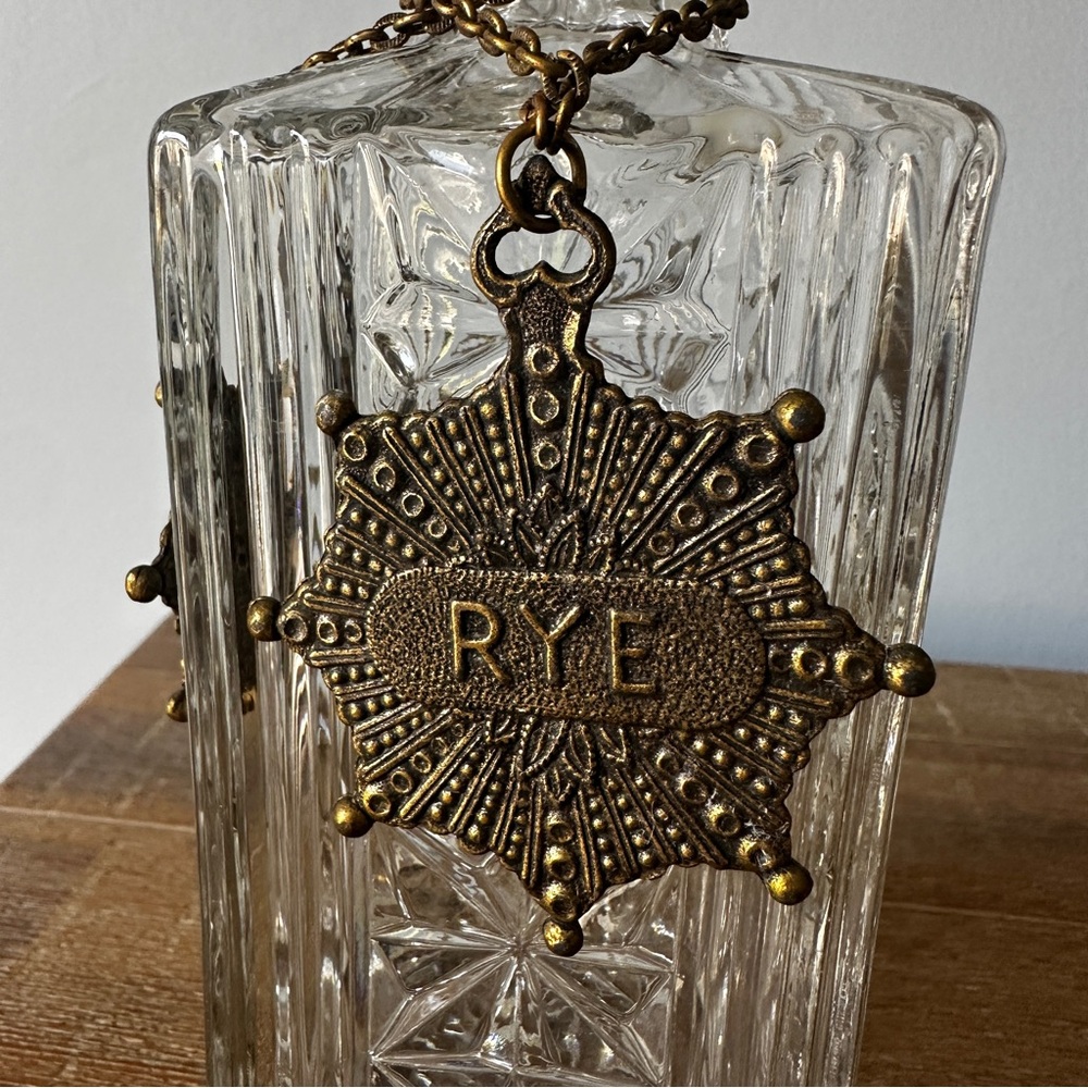 Vintage square cut-glass liquor decanter with a reversible metal medallions - Picture 6 of 7